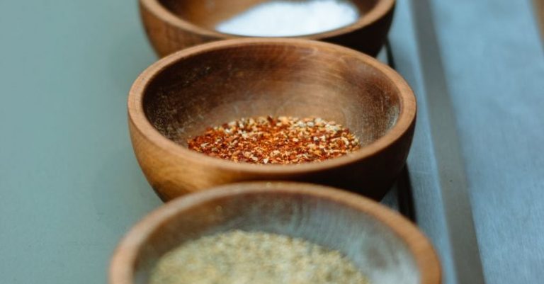 Seasonings - Close-Up Shot of Seasonings in Wooden Bowls