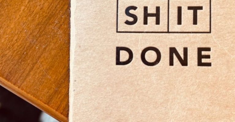 Doneness - A book with the words get shit done on it