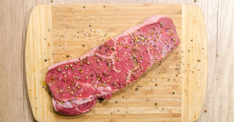 Beef - Flat Lay Photography of Slice of Meat on Top of Chopping Board Sprinkled With Ground Peppercorns