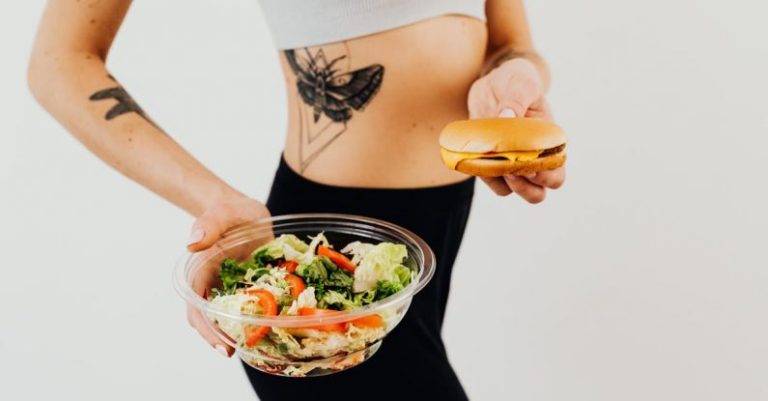 Preferences - Woman in Black Leggings Holding Food