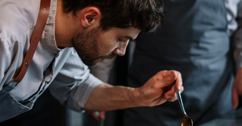 Sous Chef - Man in White Dress Shirt Holding Silver Bowl