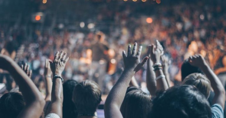 Events - Group of People Raise Their Hands on Stadium