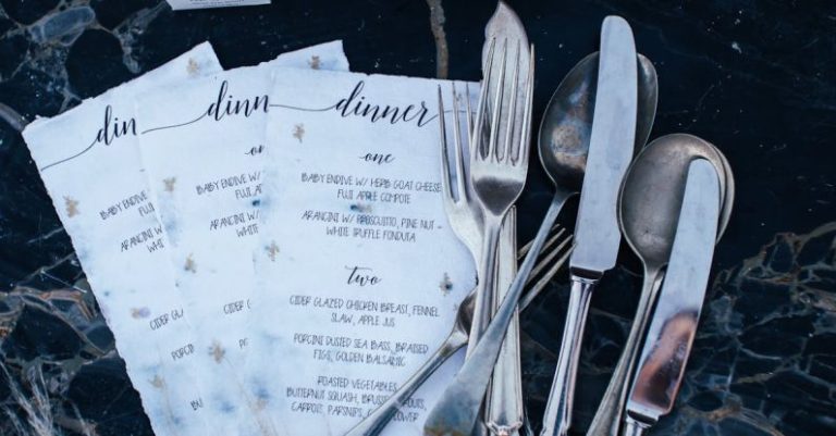 Menus - Close Up of Cutlery and Menus